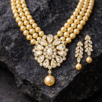 Viva Jewels Champagne Radiance Pearl Necklace Set – Triple-Strand Golden Pearl Choker with Floral Kundan Pendant and Matching Leaf-Motif Drop Earrings